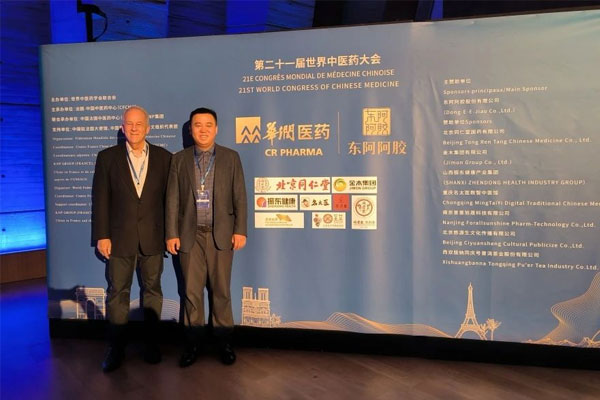 製藥董事長李昆與David L.Adelson教授參加大會